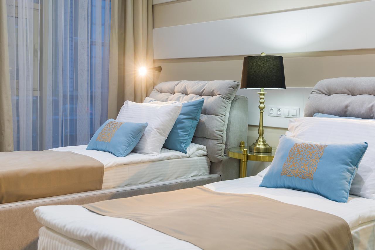 Qonaq Hotel Astana Buitenkant foto