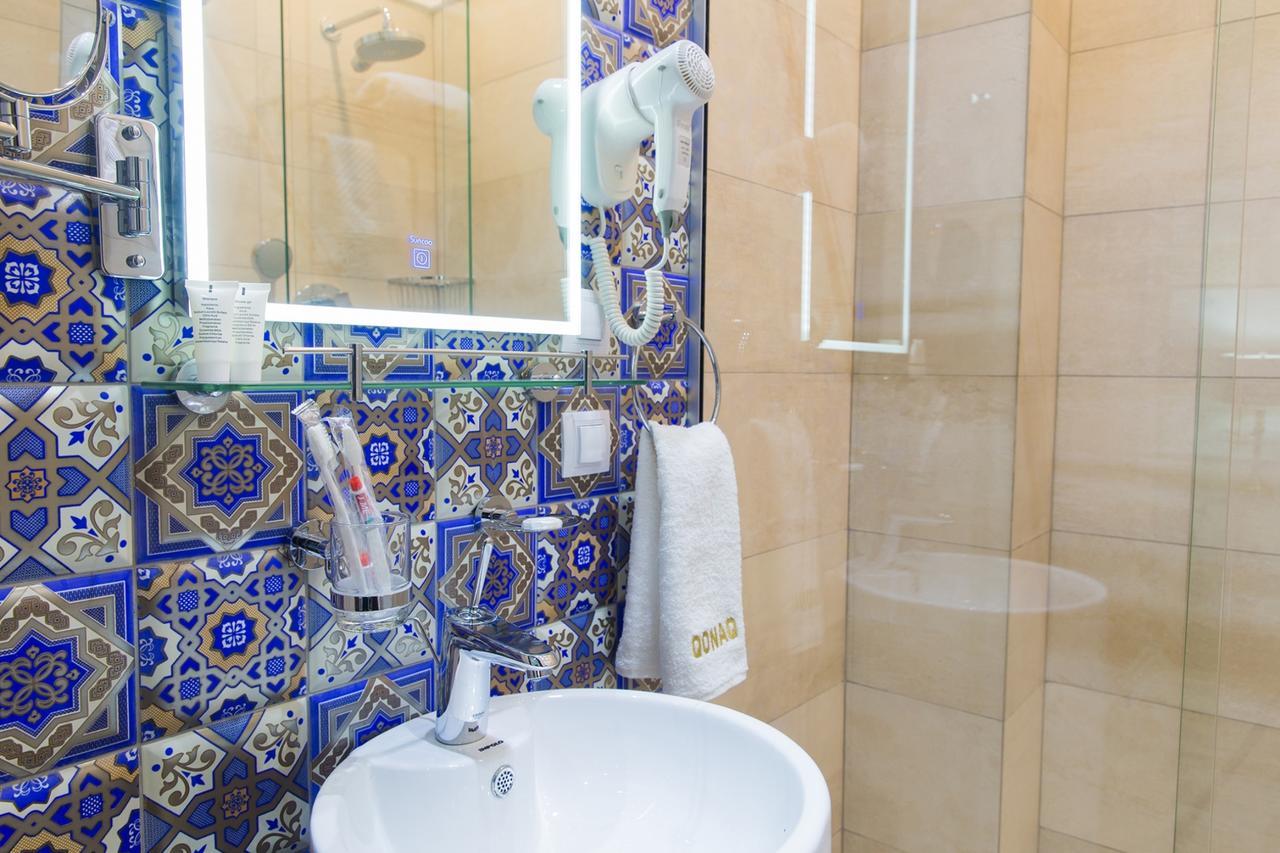Qonaq Hotel Astana Buitenkant foto